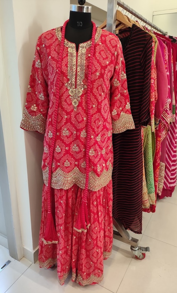 Red bandhani sharara set with gold embroidery