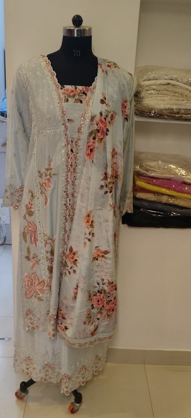 Pale blue floral kurta set with mirror-work embroidery